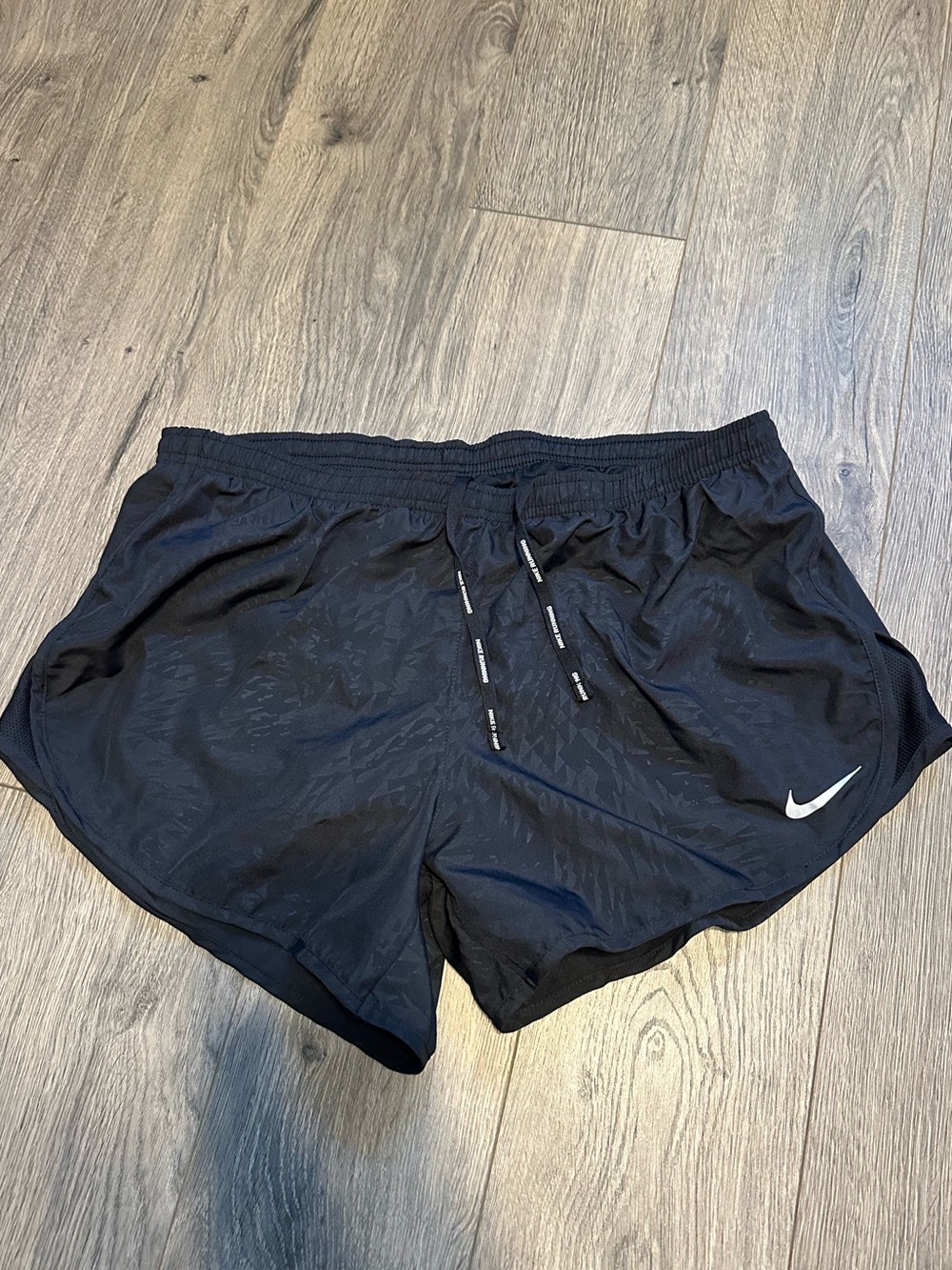 Nike Women's Black Athletic Running Shorts with White Swoosh